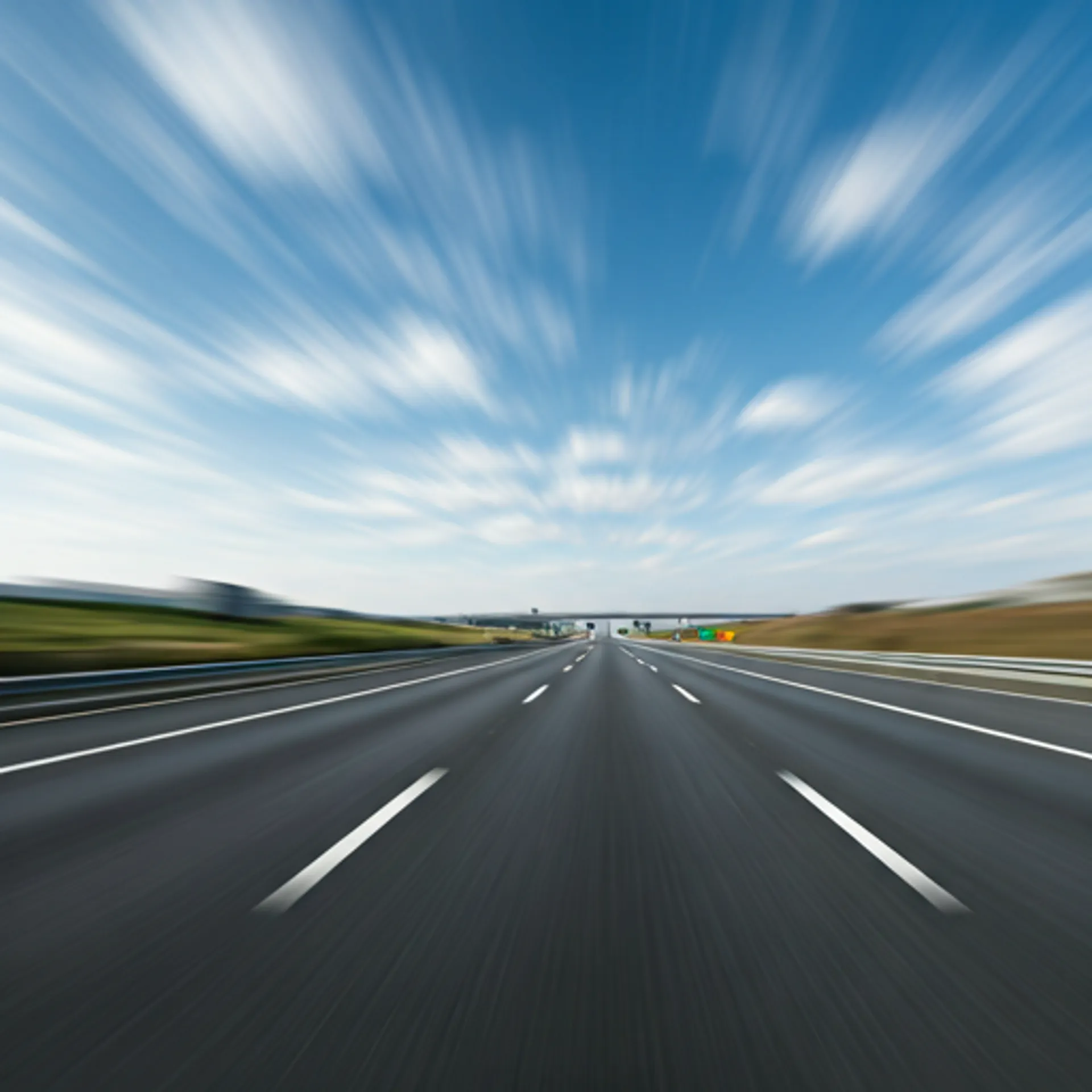 Blurred highway traffic background representing automotive theme